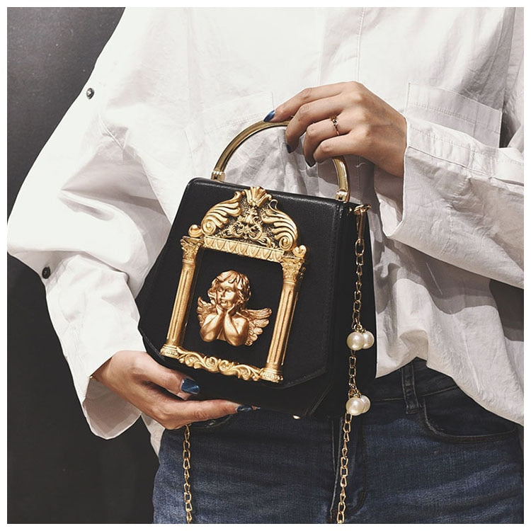 Petit sac à main baroque noir